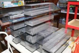15 plastic display cases ideal for displaying 1:43 and 1:18 scale vehicles. Overall length 50cm,