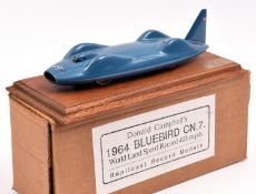 A white metal model of the 1964 Donald Campbell's Bluebird CN7 world land speed record car (possibly