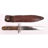 A WWI Turkish trench dagger, hilt slightly chipped, blade re-polished, incorrect sheath. GC £30-50