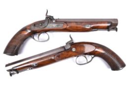 A good pair of officer's .65" percussion holster pistols, by T.E. Mortimer of Edinburgh, c 1855, 14"