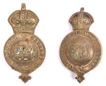 A KC martingale badge of the Bengal Cavalry, with George V cypher; and an Indian Army bit boss