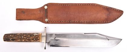 A large Bowie knife, clipped back blade 9¾", the ricasso etched "I * XL", the blade marked "IXL