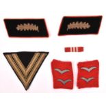 A pair of Third Reich Luftwaffe flak collar patches; a pair of high ranking officers collar patches;