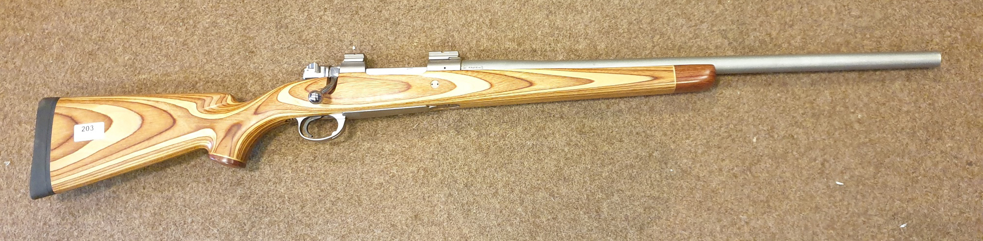 **A custom built 9.3 x 64mm bolt action rifle, number 7290, 44" overall, heavy stainless steel