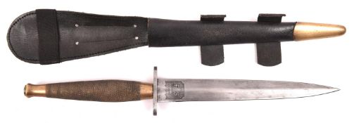 A Second pattern FS fighting knife, the blade etched "The F.S. Fighting Knife", in panel, with brass