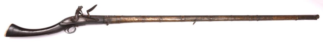 A 20 bore Indian flintlock jezail, 66" overall, ex-matchlock barrel 51½", the breech with traces