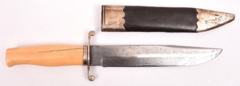 A nice old Bowie knife, unmarked slightly clipped back blade 8", the hilt having silver crossguard