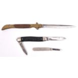 An unusual folding small jack knife, brass hilt with wood grip; also 2 old penknives. GC £30-40