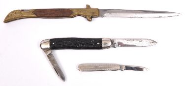An unusual folding small jack knife, brass hilt with wood grip; also 2 old penknives. GC £30-40
