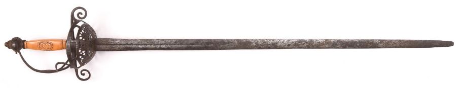 A 17th century rapier, broad blade 33", the shallow fullers showing signs of having had an