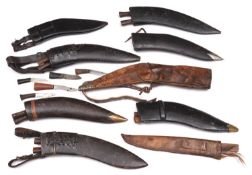 8 Gurkha kukri sheaths; 22 companion skinning knives and one other sheath. GC £30-35