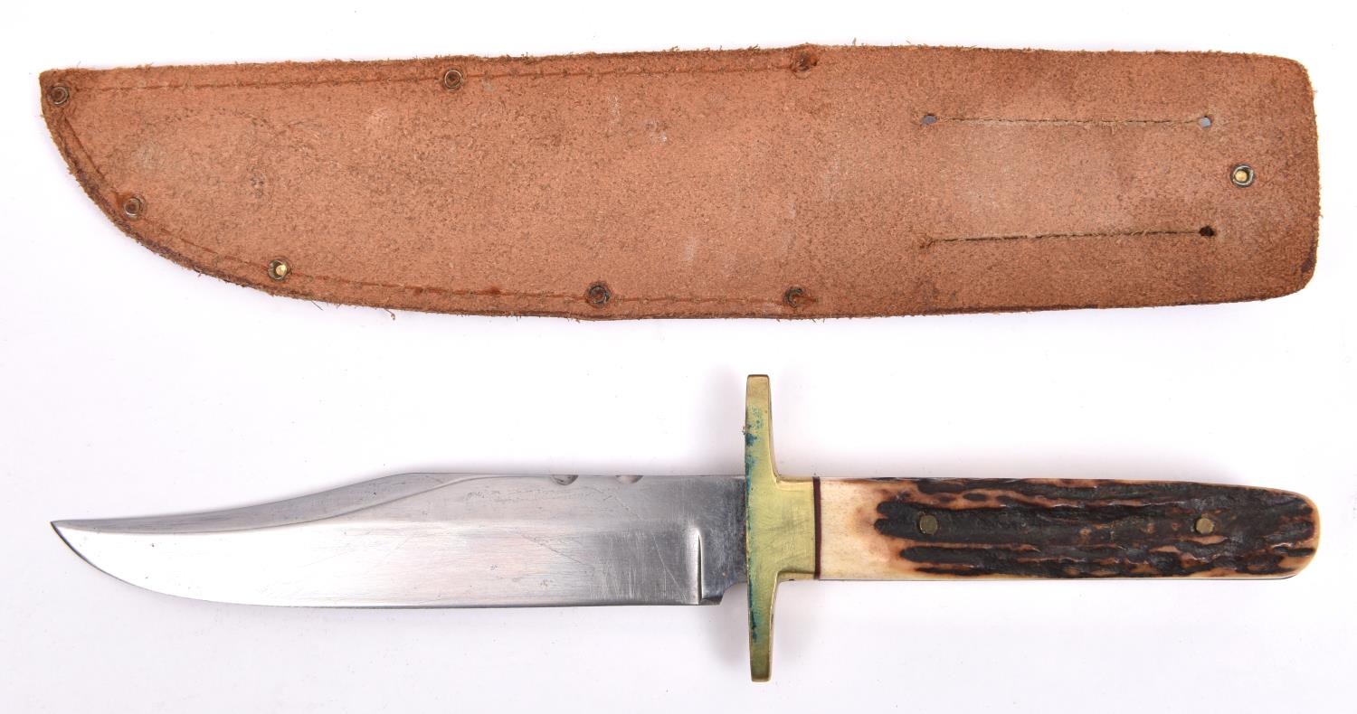 A Bowie knife, clipped back blade 5¾", with partly scalloped back edge, the hilt with brass - Image 2 of 2