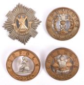 Four OR's helmet plate centres: Royal Scots, as for glengarry (no loops), Norfolk, Cheshire, and