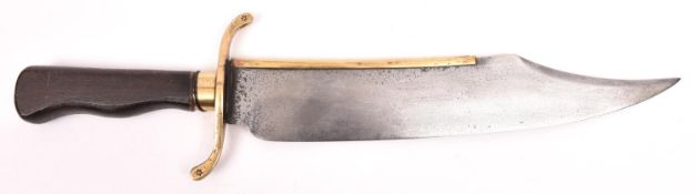 A massive Bowie knife, clipped back blade 13½" with brass covered back edge, the hilt having 5"