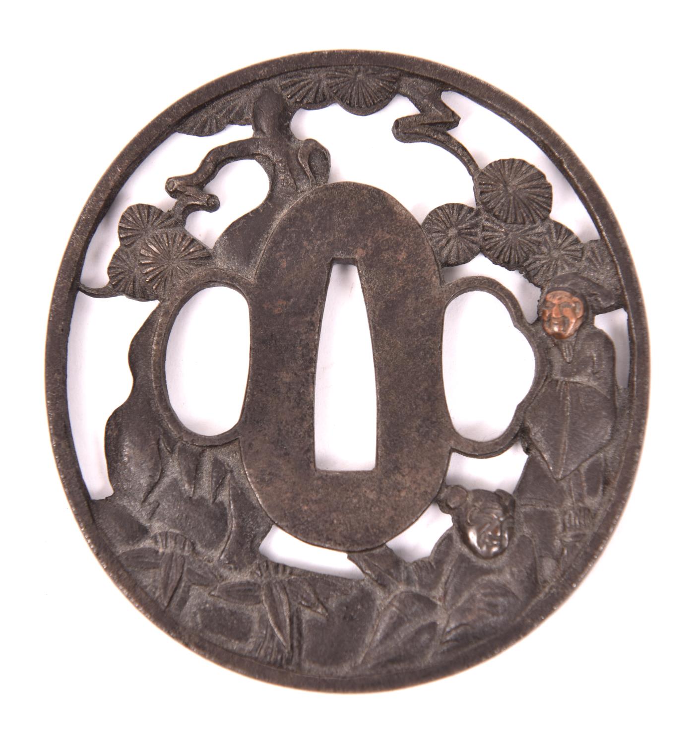 A Soten style tsuba, showing 2 figures amid foliage. GC £200-300