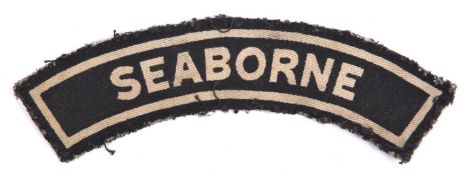 A rare Observer Corps D-Day "SEABORNE" printed cloth shoulder title. GC £150-250