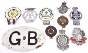 A Vintage AA GB badge; an Artists Rifles cap badge; an early post war AA badge; 2 RAC Auto Cycle