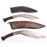 A kukri, horn hilt with WM mounts, in its leather covered sheath (split); and another kukri, with