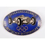 A scarce Third Reich motoring badge, blue enamel oval 2¼" WM picture of racing car and "