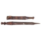 An East African Mashona knife or short sword, crudely forged DE blade 16", one piece wooden hilt