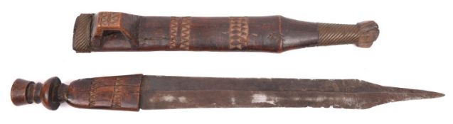 An East African Mashona knife or short sword, crudely forged DE blade 16", one piece wooden hilt