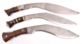 A kukri with brass mounted horn hilt; and 2 other kukris with rivetted wood grips. GC (no
