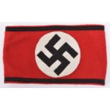 A Third Reich NSDAP armband, red cloth with applique swastika and braiding, RZM paper label on