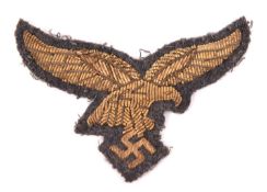 A Third Reich Luftwaffe Officers gilt bullion eagle. VGC £150-175