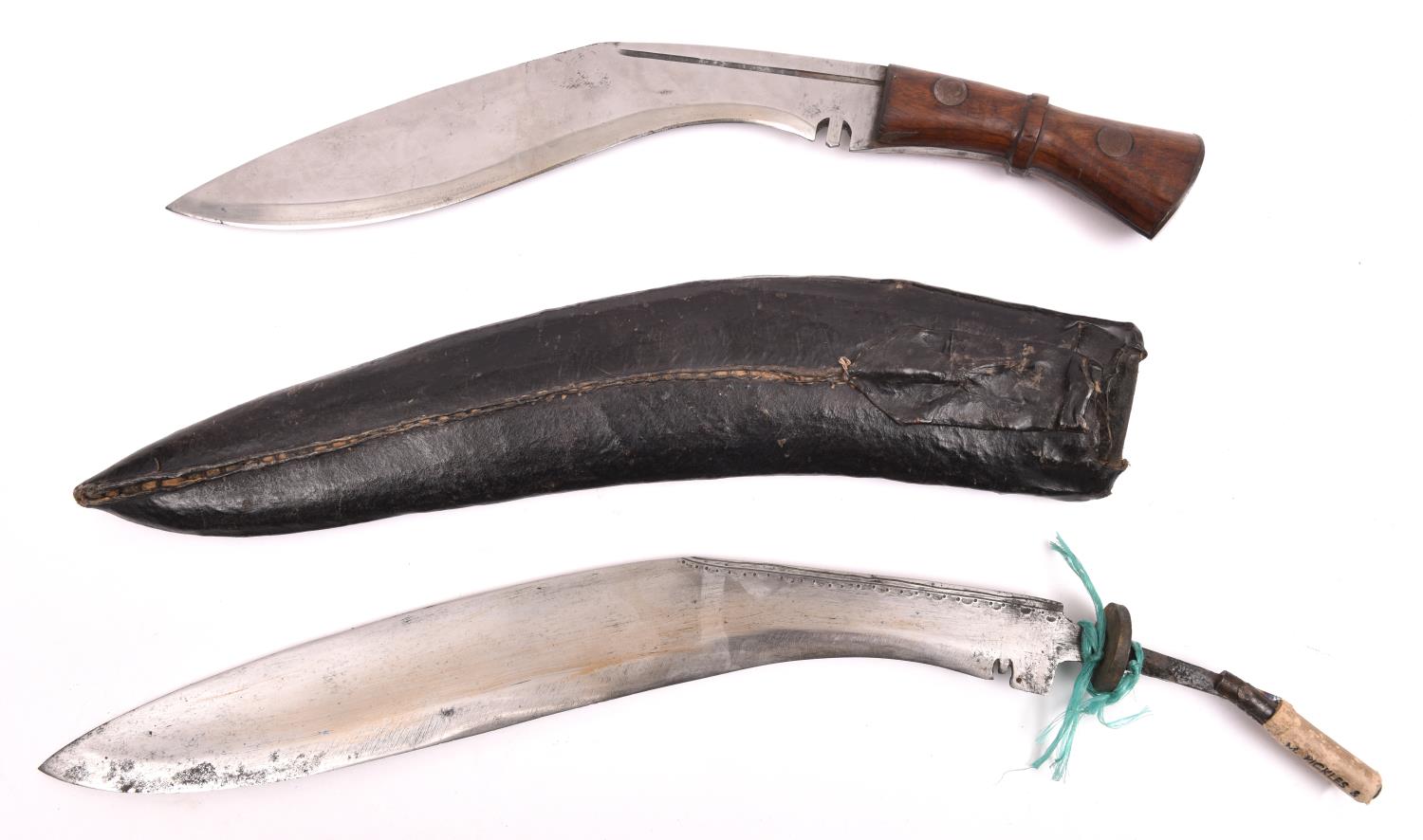 A kukri, the blade stamped with a broad arrow and "INDIA", with rivetted wood grips, no sheath; - Image 2 of 2