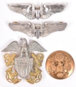 A WWII US Naval officers' cap badge; 2 silver US Air Force Bombers wings and 1 other badge. GC (