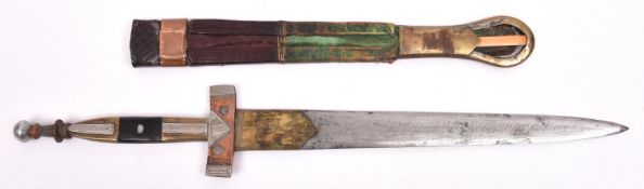 An African dagger with brass and copper mounts, in its sheath of leather with metal mounts. GC £20-