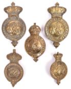 Two martingale badges, with "VR" cypher, Guelphic crown, and Garter motto, and a similar bit boss (
