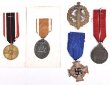 Third Reich medals: 25 year Faithful Service Cross; Eastern Front medal; West Wall medal; War