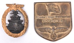 A Third Reich High Seas Fleet Badge, dark grey centre, gold washed wreath; also a die struck