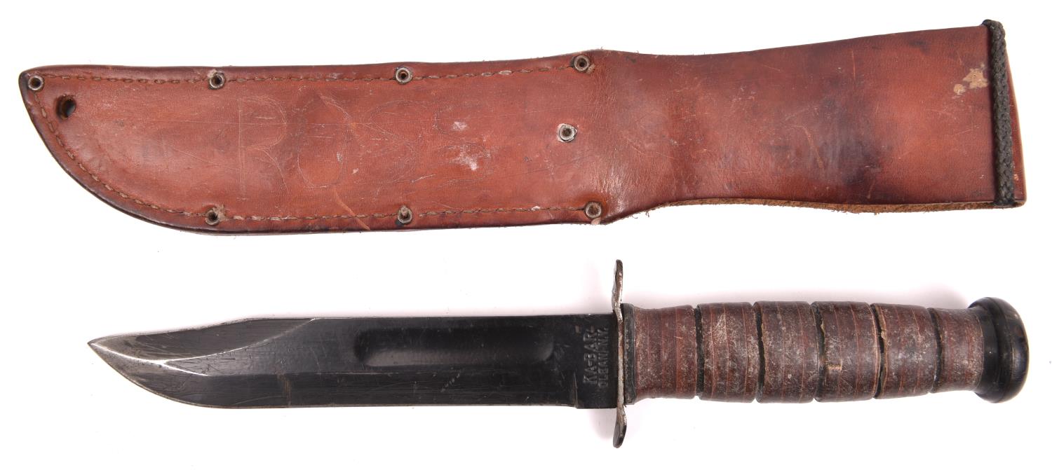 A USMC Mark I Ka Bar knife, the blackened blade marked "USMC" and "KA-BAR OLEAN-N.Y.", in its - Image 2 of 2