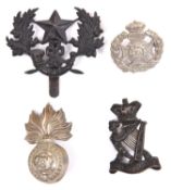 Four Vic Infantry cap badges: small WM Ryl Fusiliers, small blackened brass Cameronians pugaree with