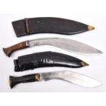 A military pattern kukri, the blade marked "Pioneer 43 Calcutta", with rivetted wood grips, in its