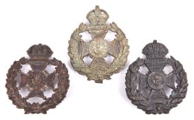 Three Rifle Brigade cap badges: pre 1903 with Guelphic crown, similar to Militia Bn, and WM 1903-