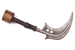 An African Mangbetu sickle knife "Xopsch" or "Trumbash", 16" overall, the wooden hilt partly bound