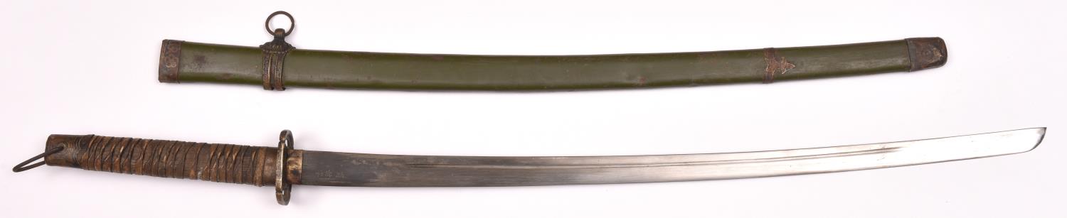 A WWII Japanese officer's sword, blade 27½", has Japanese markings, brass mounted hilt, in its brass