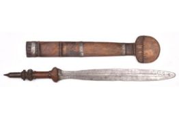 An African Yaka sword, leaf shaped blade 17" with simple two line punched decoration, the hilt