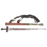 A Tuareg sword, tapered DE blade 31" with three narrow full length fullers; leather covered