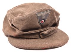 A Third Reich army man's peaked field cap, bevo type badge, GC (lining frayed) £70-80
