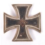 A 1939 Iron Cross 1st class, the back of the pin stamped "20", GC (requires cleaning). £50-60