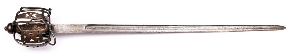 A mid 18th century Scottish basket hilted backsword, blade 34" with one broad and one narrow