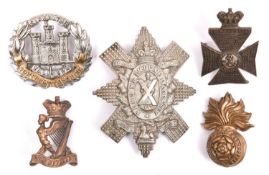 Five Vic or early Infantry cap badges: small Ryl Fusiliers, Black Watch (1 lug missing), pre 1900