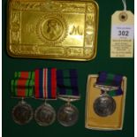 Three: Defence, War (un-named as issued), GSM 1918-62, 1 clasp Malaya, Geo VI issue (14457085 Cpl