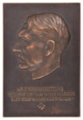 A Third Reich bronze plaque, Hitler's profile with "Die Voraussetzung Zur Tat Ist Der Wille Und