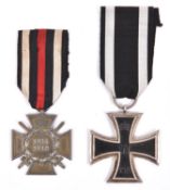 A 1914 Iron Cross 2nd class, the ring stamped with number code, (illegible), and a 1914-18 Honour