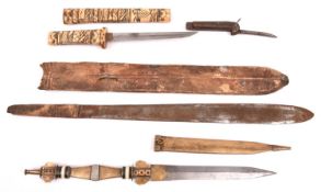 A short Masai type sime; a Japanese bone dagger; a military jack knife and an Arab dagger in a brass